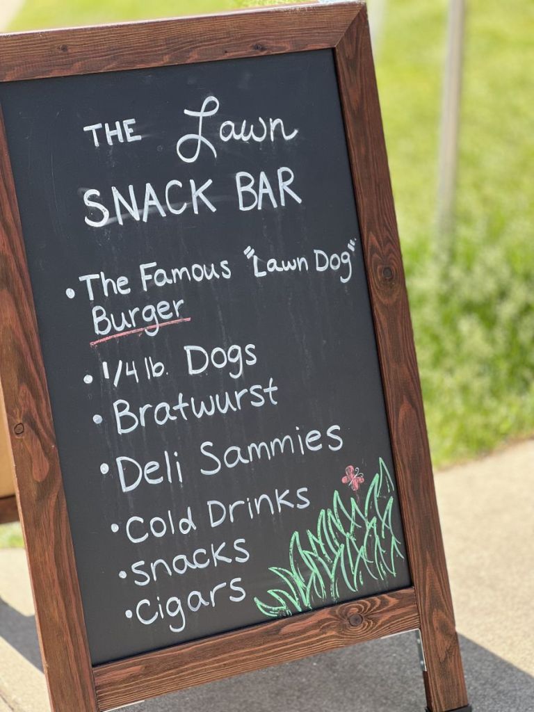 The Lawn Snack Bar sign